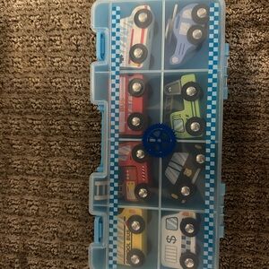 Melissa & Doug wooden vehicles in clear blue carrying case